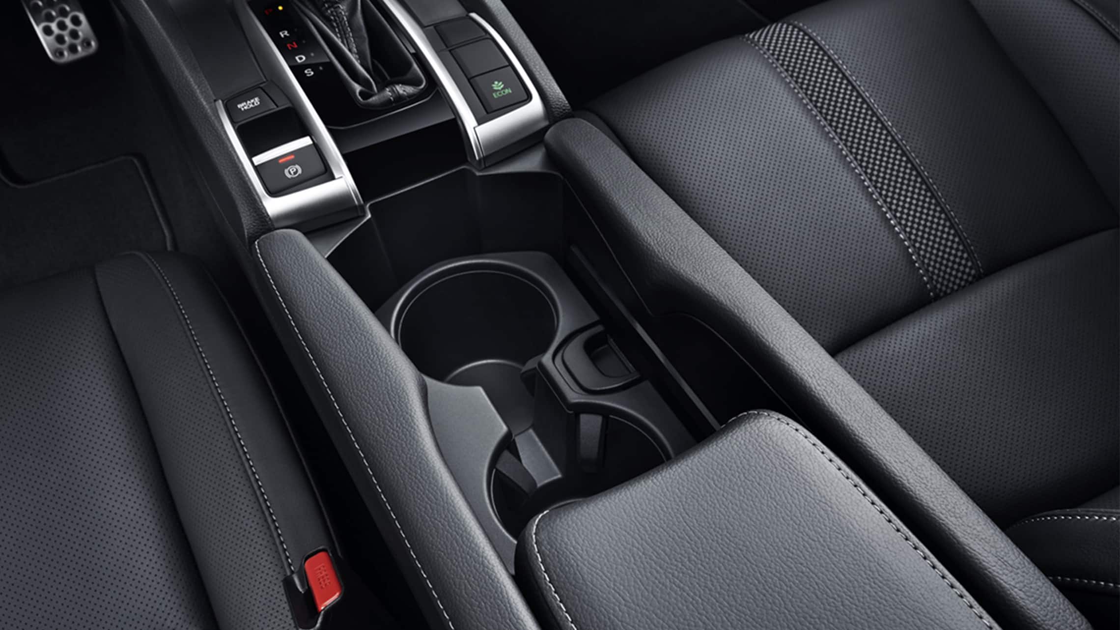 Detail of beverage holders in the 2021 Honda Civic Sport Touring Hatchback.